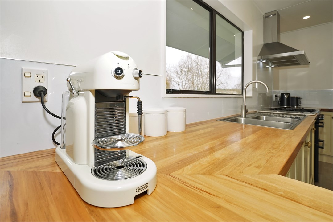 Fully equipped Kitchen area with a coffee machine