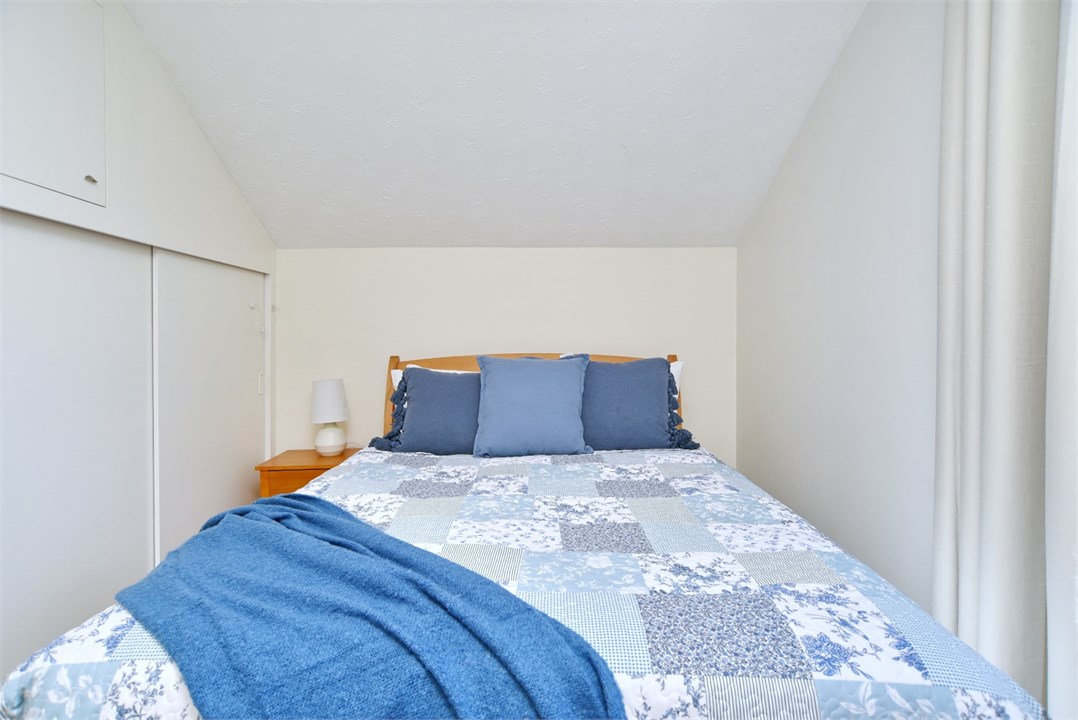 Bedroom 3 has a Queen bed