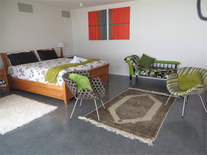 King Sized bed and funky furnishings