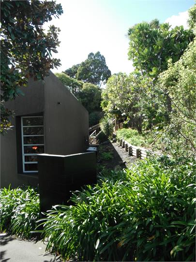 South side of home from neighbours drive