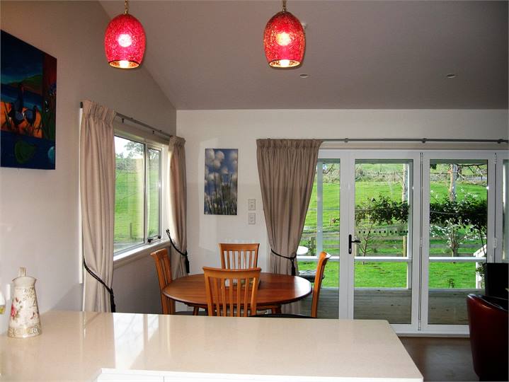 Dining area which opens out to a large deck