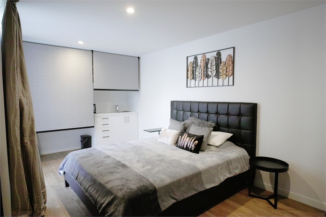 Bedroom 1 has a Super King bed and a Kitchenette