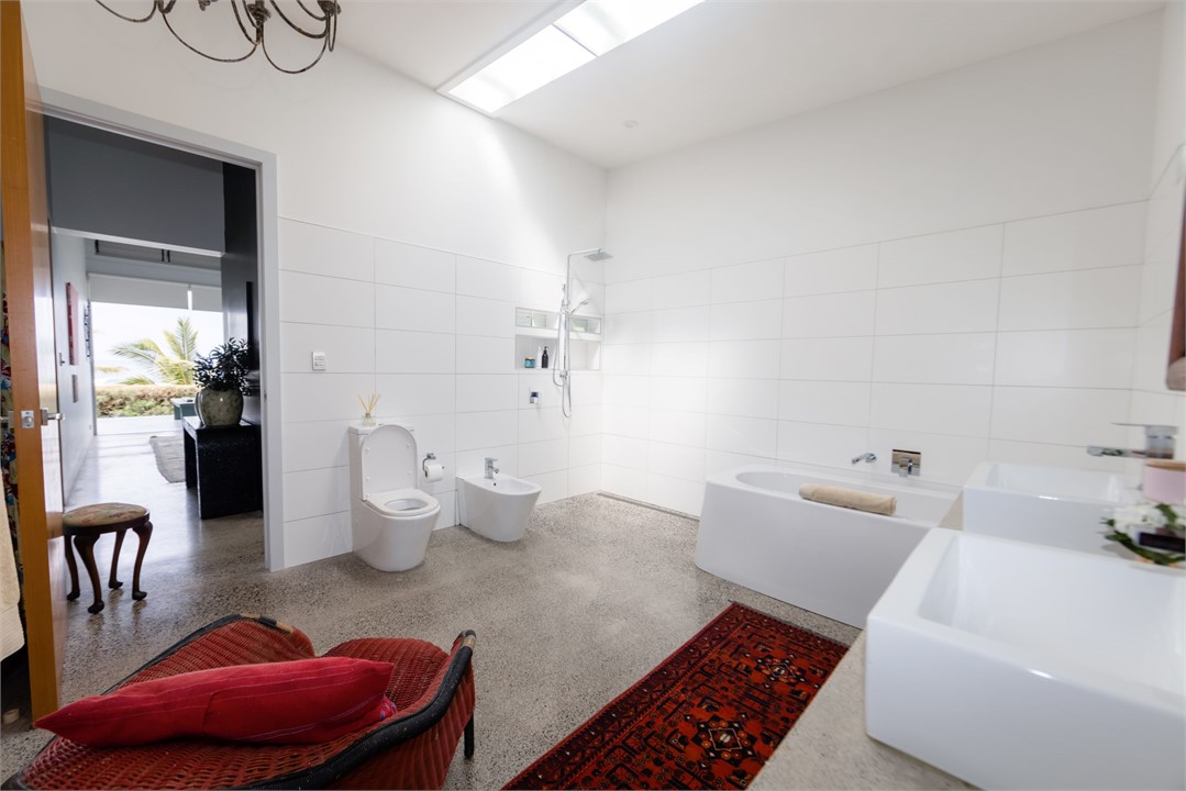 Master bathroom with bath