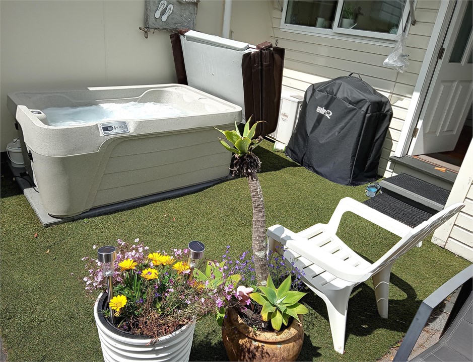 New 2-pp spa - covered by pergola for all-weather