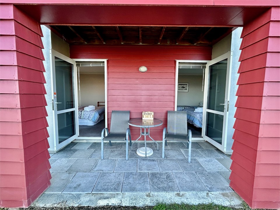 Covered out door patio - outside the bedrooms.