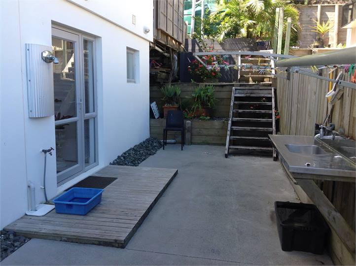 Outside fish filleting station and hot shower