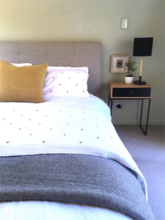 Bedroom 2 on ground level (Queen) has doors openin