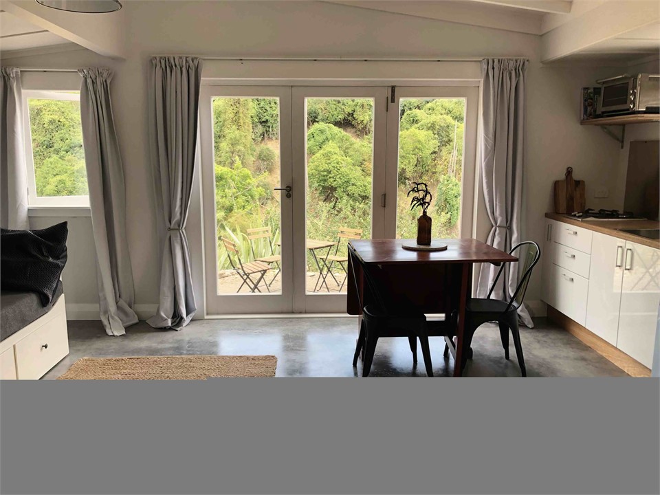Kitchen/dining area opens onto a private terrace