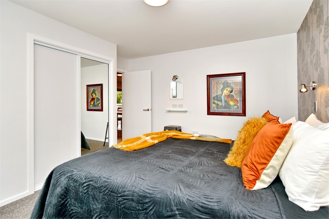 Bedroom 1 has a King sized bed and a sitting area