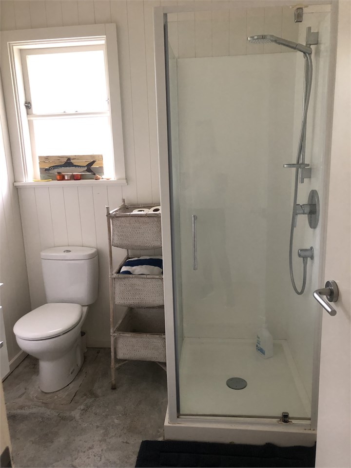 main bathroom with a strong shower