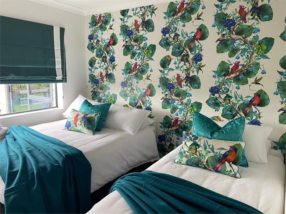 Double & Single beds downstairs with lake view