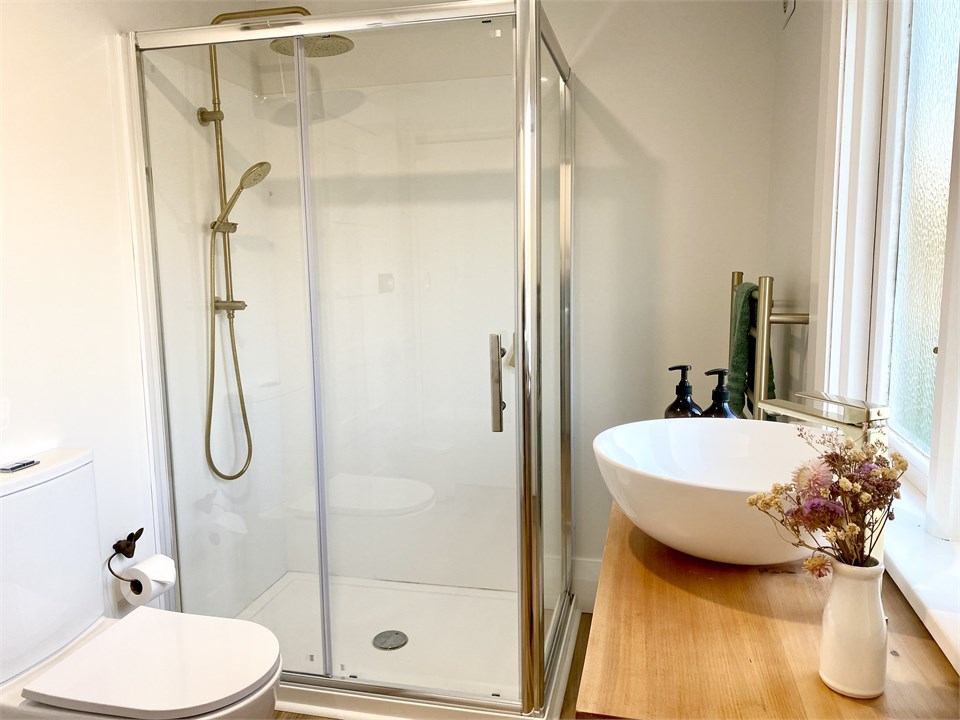 The bathroom offers luxury fittings.