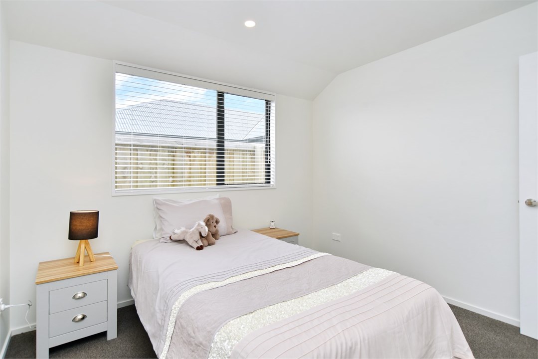 Relax in this cozy king single bedroom