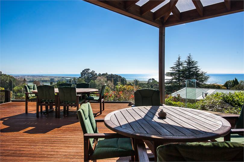 Sheltered deck area under glass roof