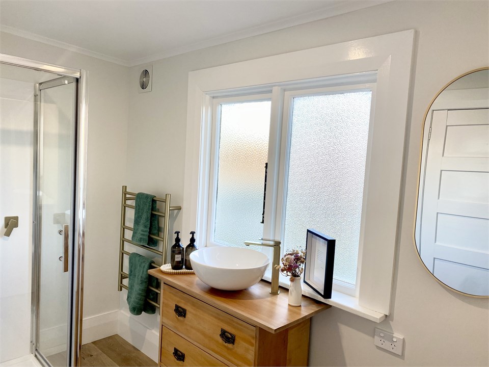 The bathroom offers luxury fittings.