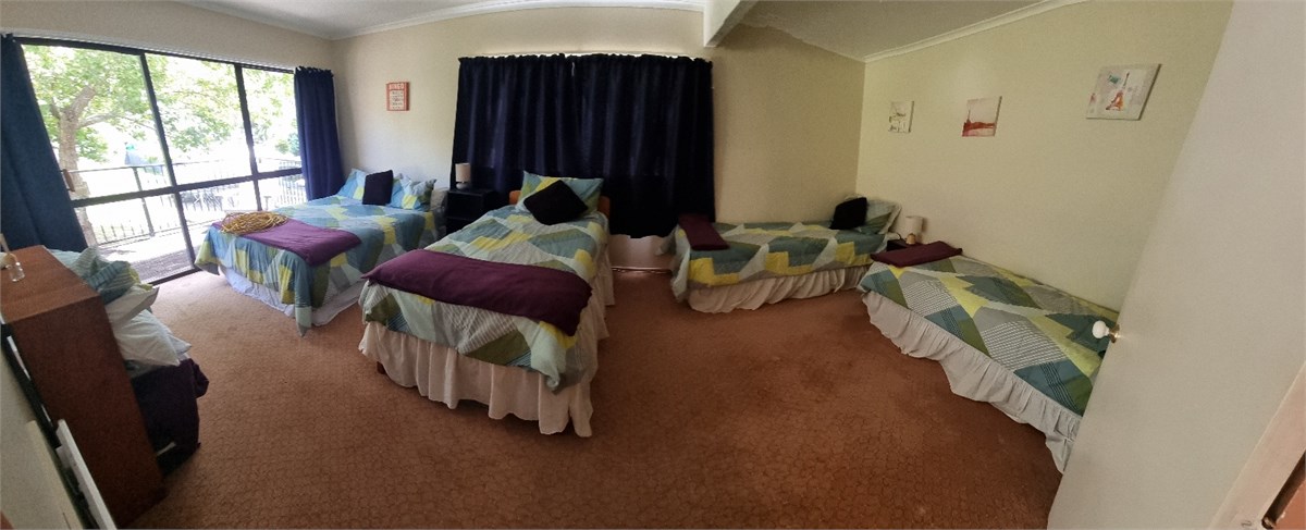 Bedroom 3 set up as 3 singles and a double bed