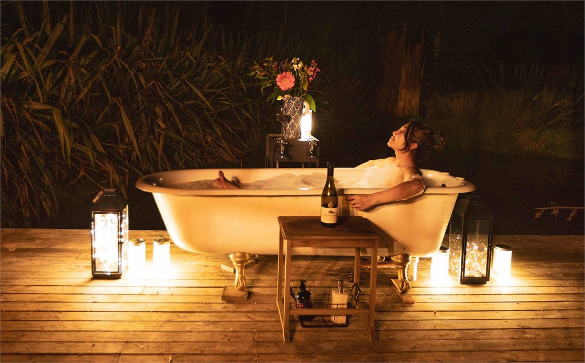 Kissing Gate: bath on jetty over pond