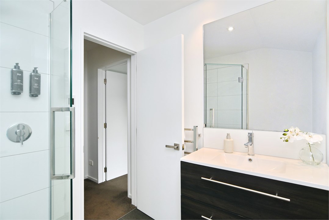 Bathroom 2 has a shower and a toilet