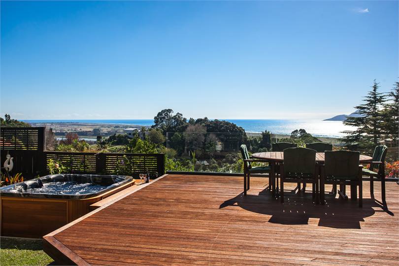 Sunny north facing deck and spa pool with expansiv