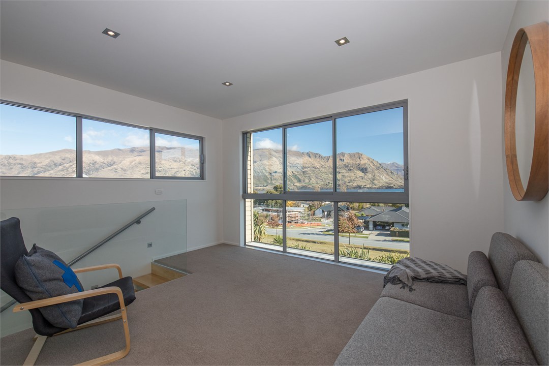 Stairs lead up to the 'Landing', couch converts to