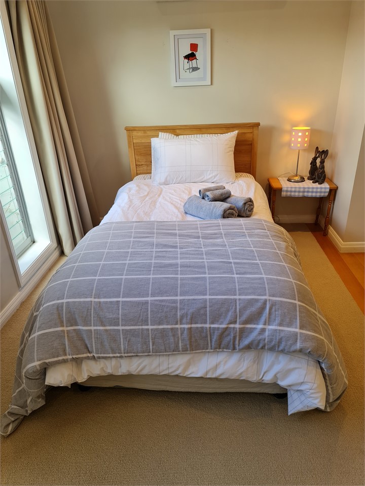 King single bed with single trundle under