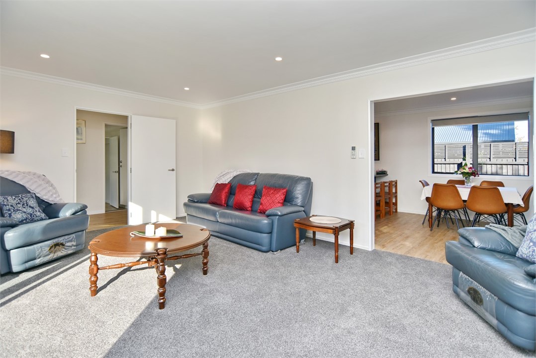 Living area with a TV and sitting areas