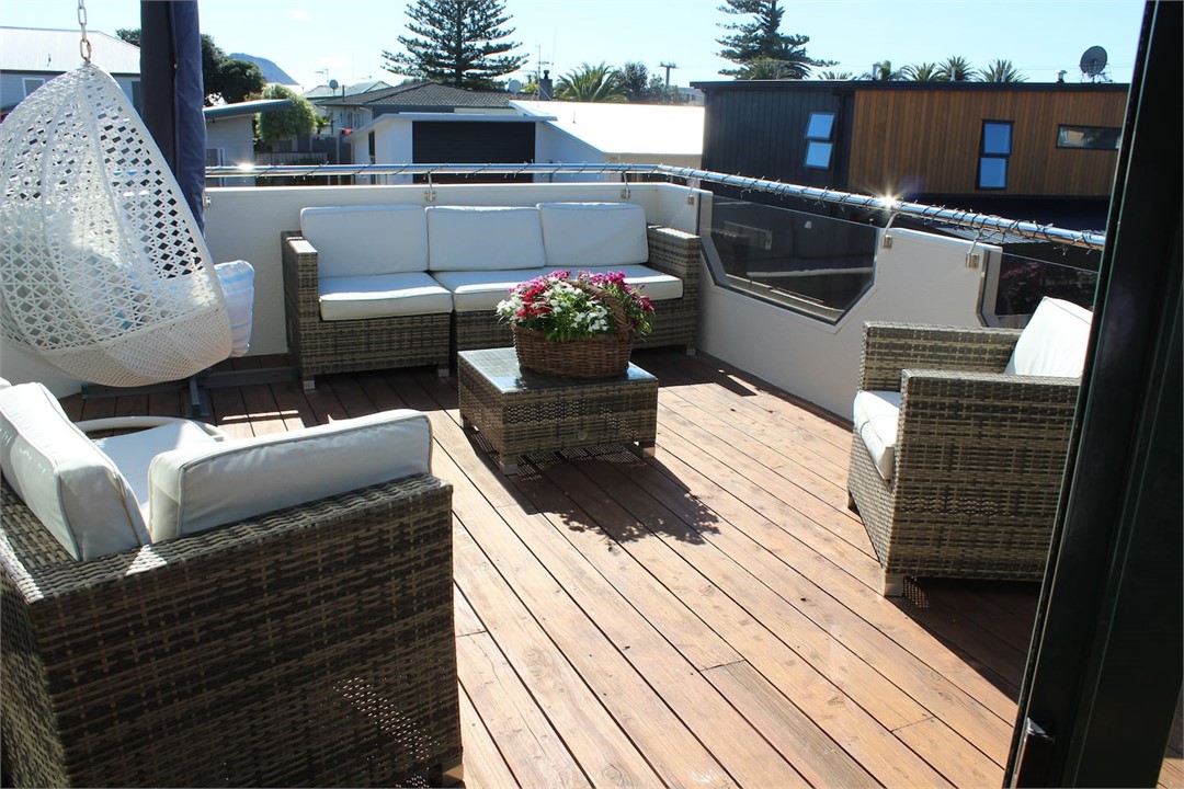 Deck photo - taken from dining area - all on livi