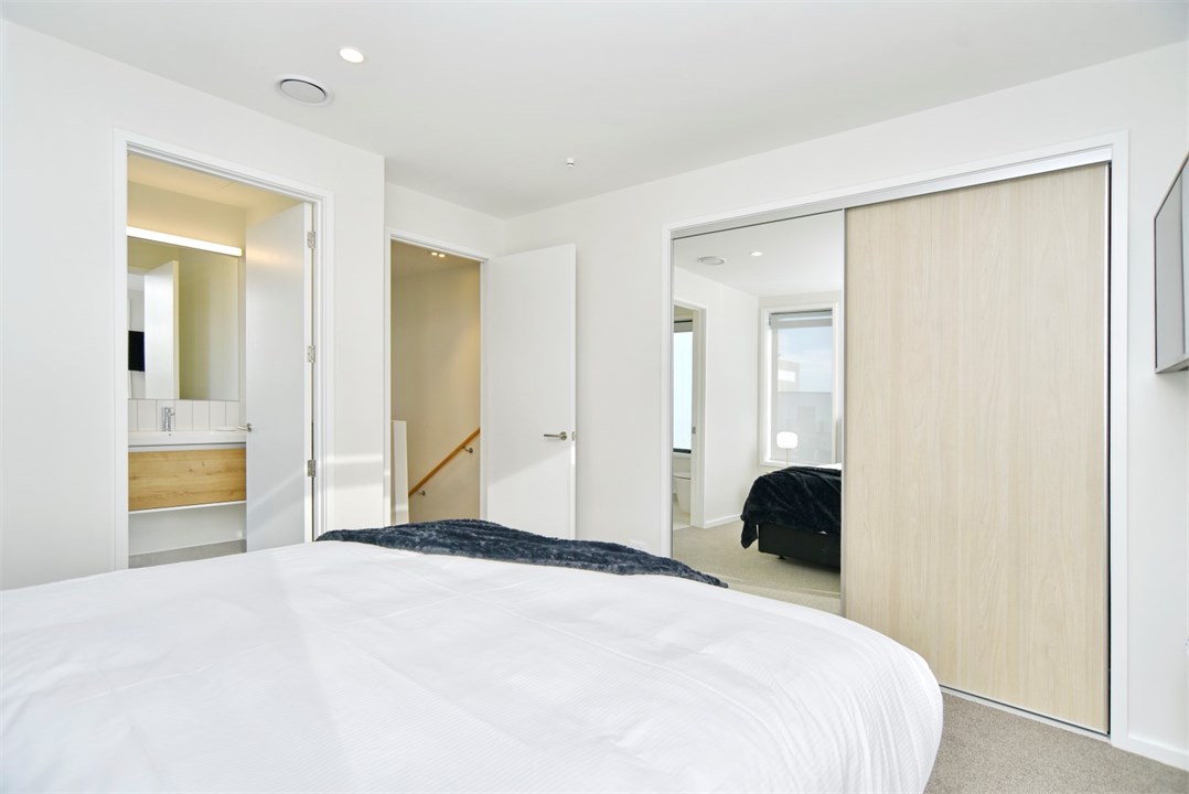 Bedroom 1 has a King bed, TV and an ensuite