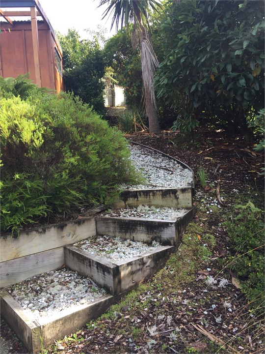 Steps up from barbecue area