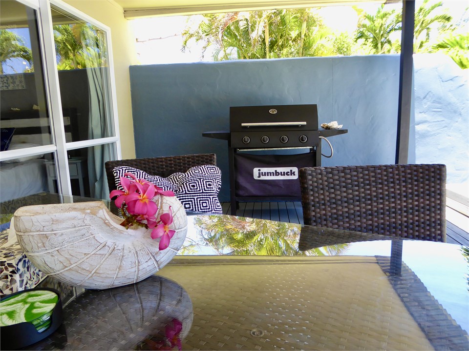 the large lagoon facing deck also has a BBQ