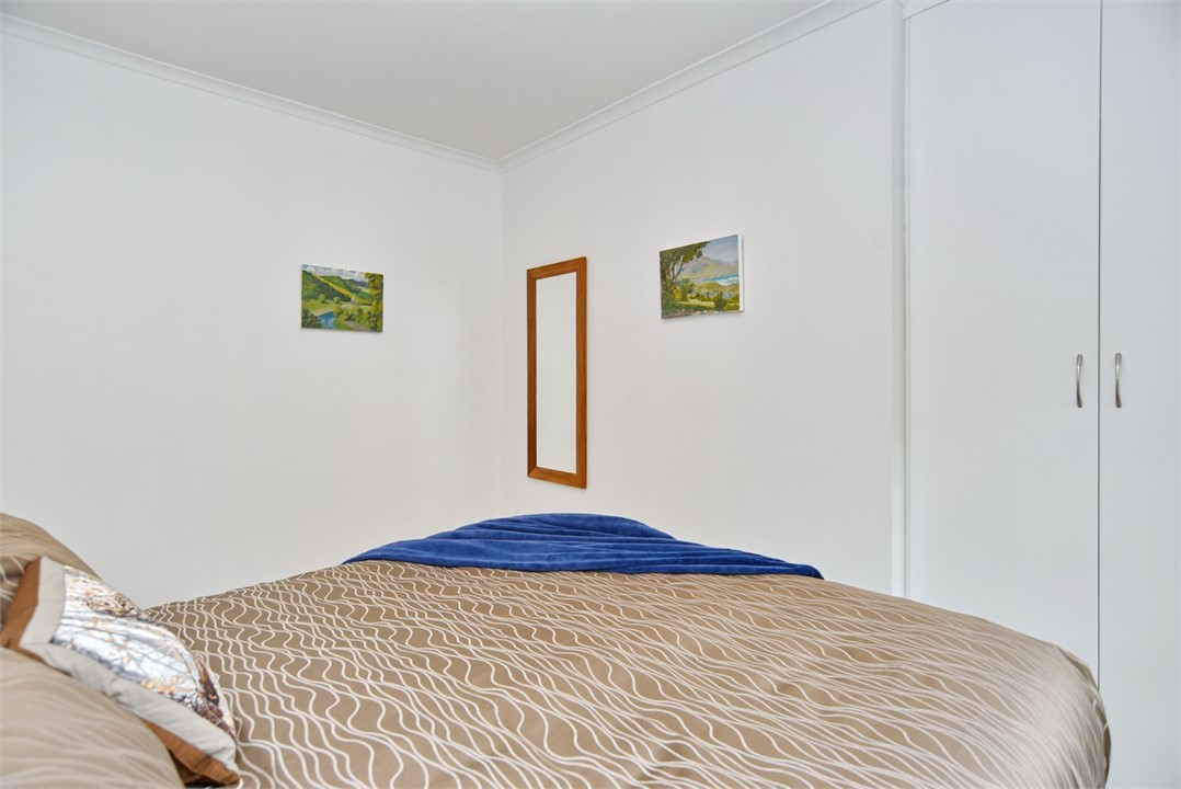 Bedroom 1 has a Queen bed