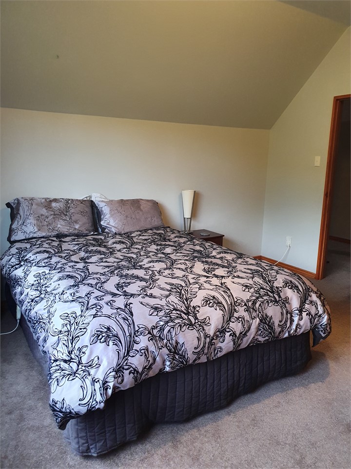Queen bed upstairs.