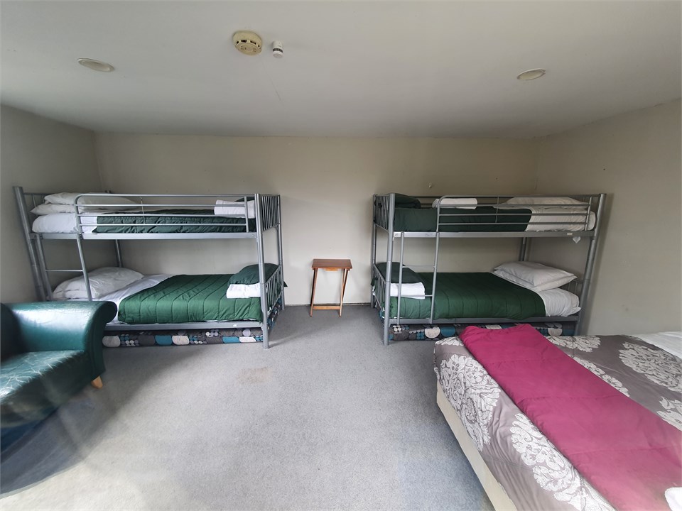 Sleepout with queen bed and bunks
