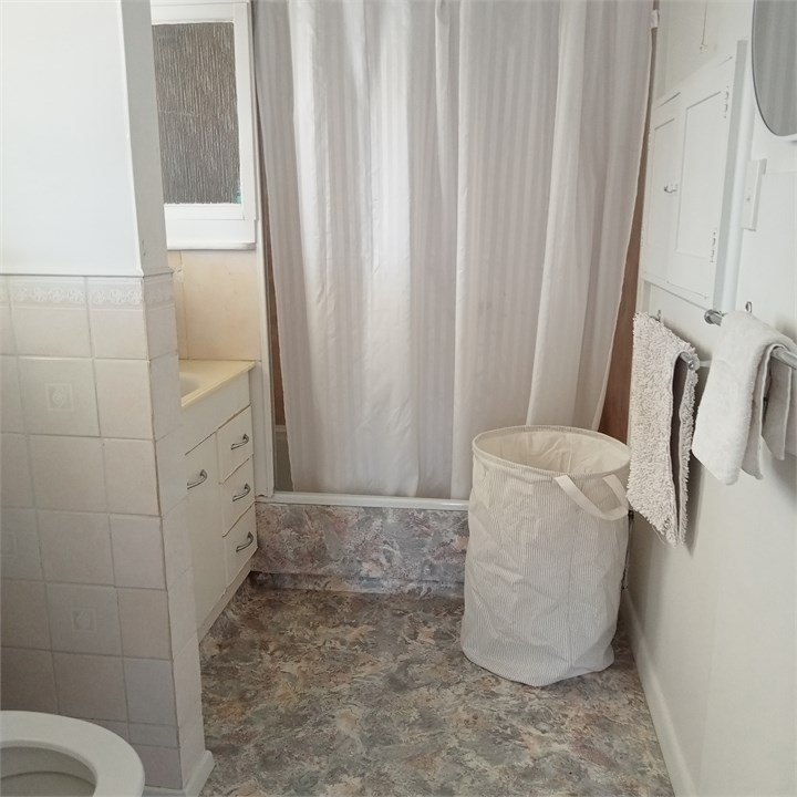 Bathroom with shower over bath