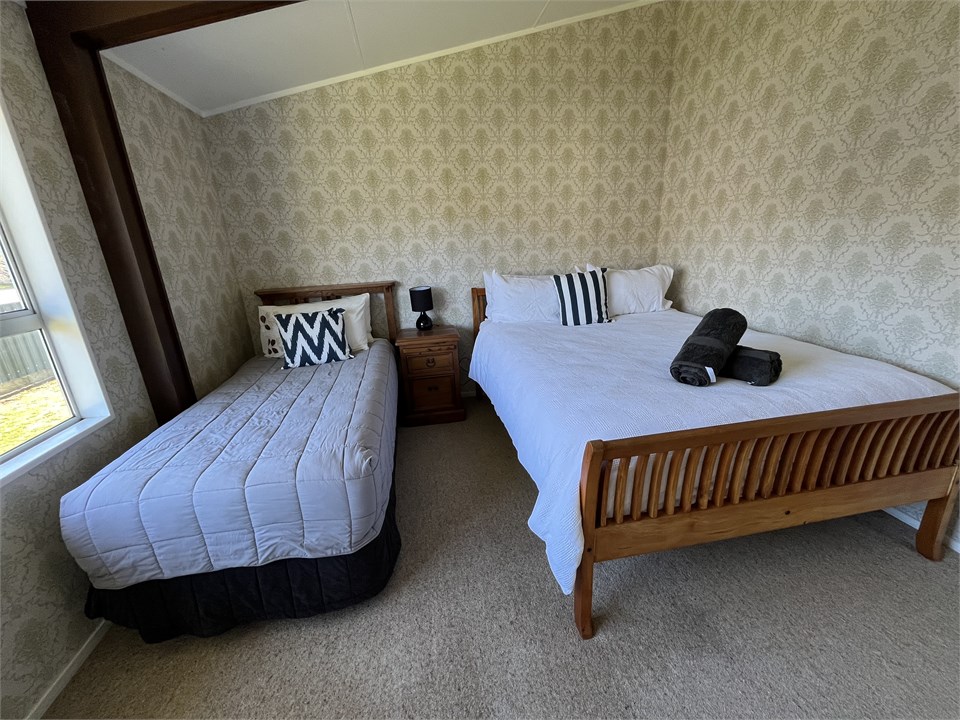 Queen Bed plus Single bed.