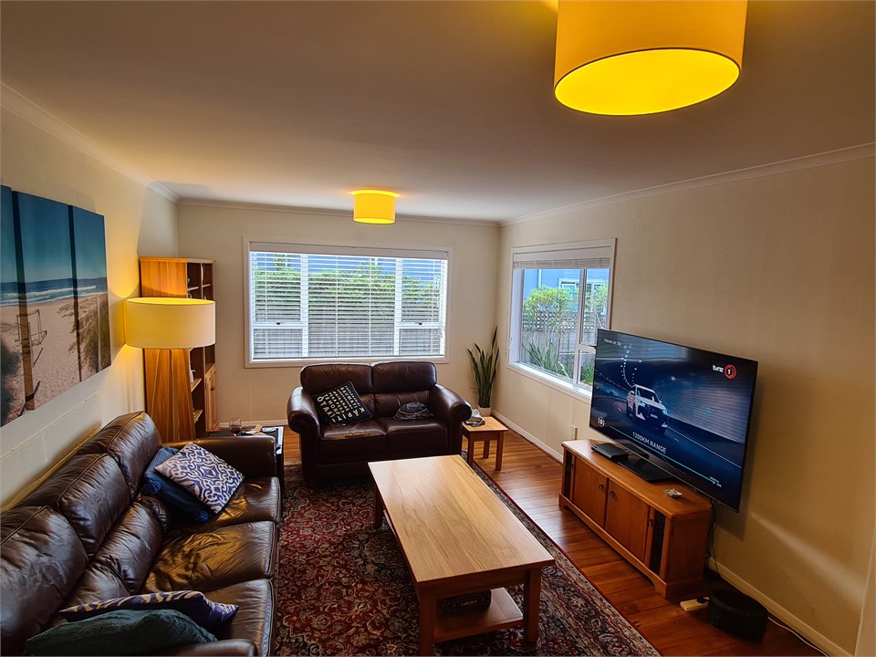 Living room with large TV and fibre internet