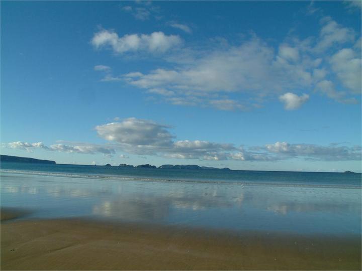 Beach Reflections Opito Bay