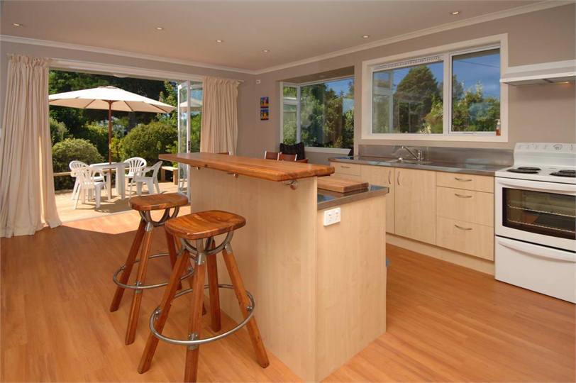 Kitchen & dining opening onto deck