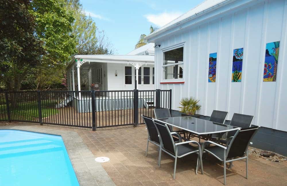 Outdoor dining and swimming pool - shared space wi