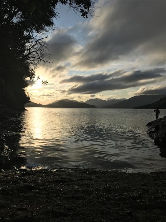 Fishing at dusk in the cove