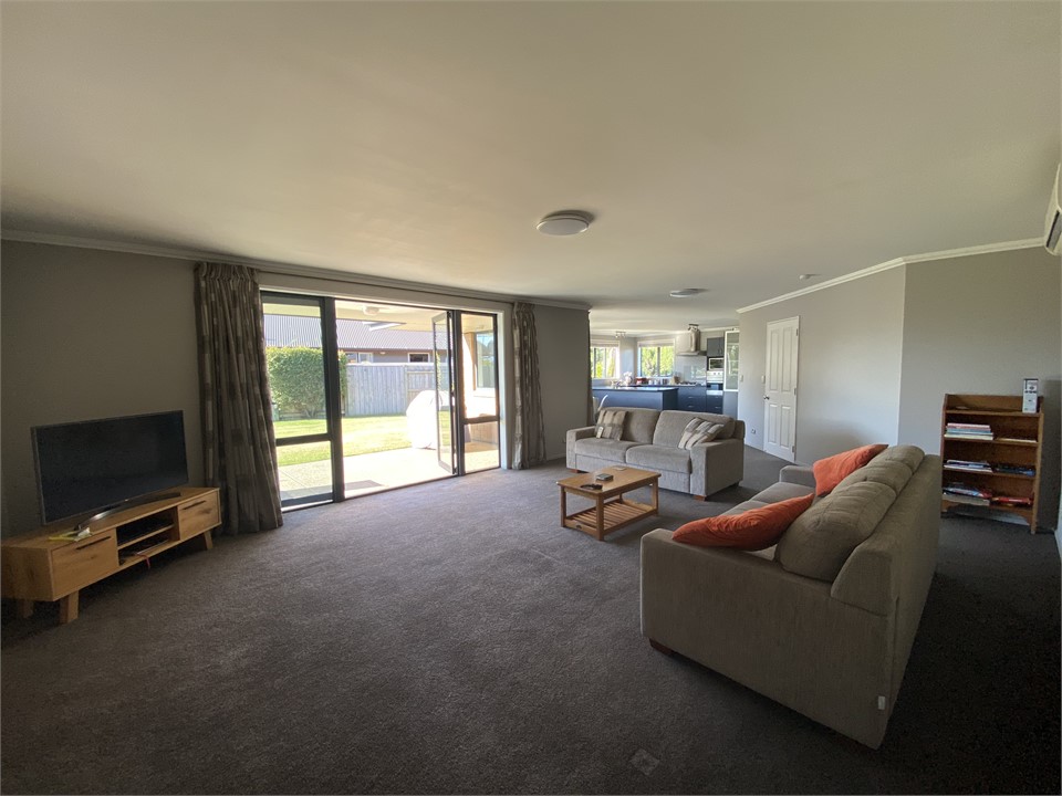 Lounge looking towards dining area and kitchen