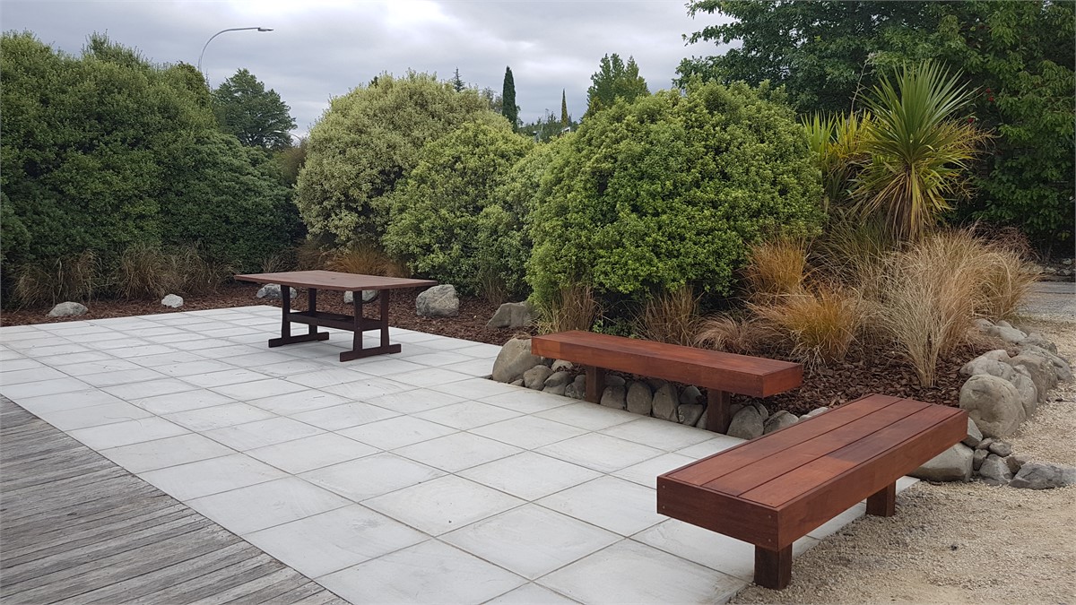 Outdoor living - large paved area in garden settin