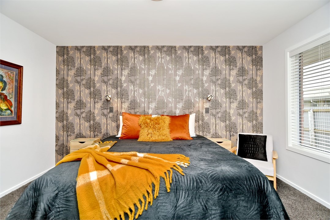 Bedroom 1 has a King sized bed and a sitting area