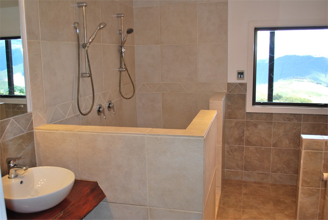 Double shower, double sinks and toilet