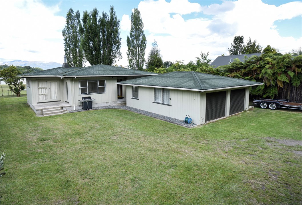 Back of house - showing the garage (which is lined