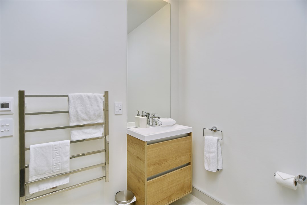 Bathroom 1 has a shower and a toilet