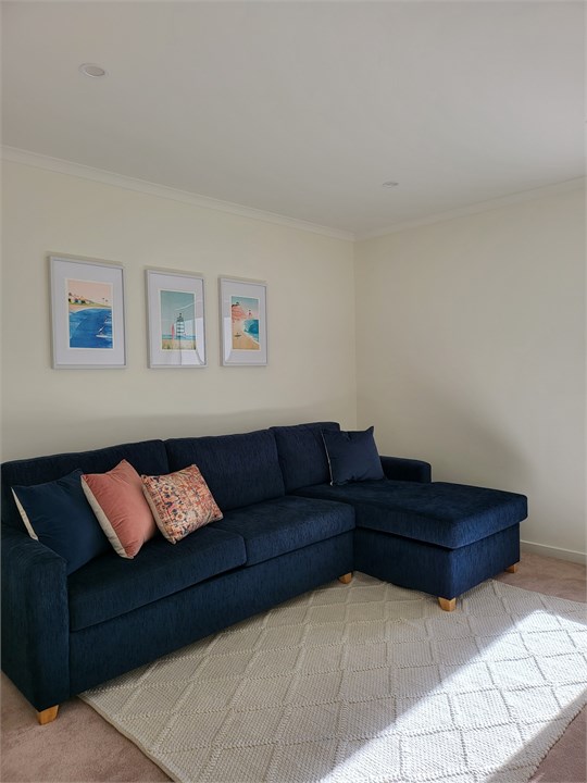 TV room. This couch goes in a double bed