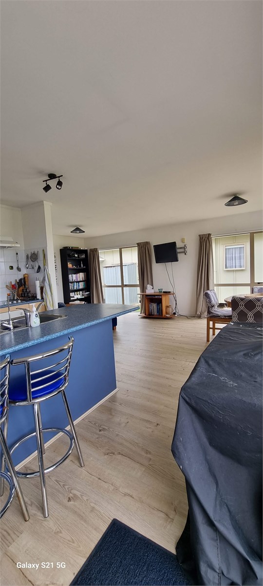 View inside from ranchslider entry - TV & unit