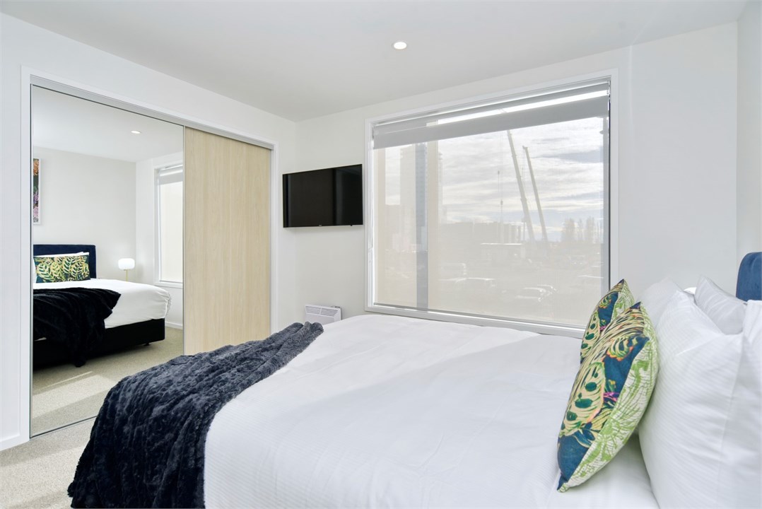 Bedroom 1 has a King bed, TV and an ensuite