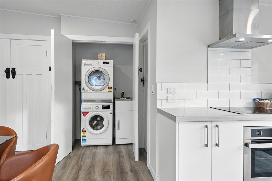 Laundry area with a washing machine and a dryer